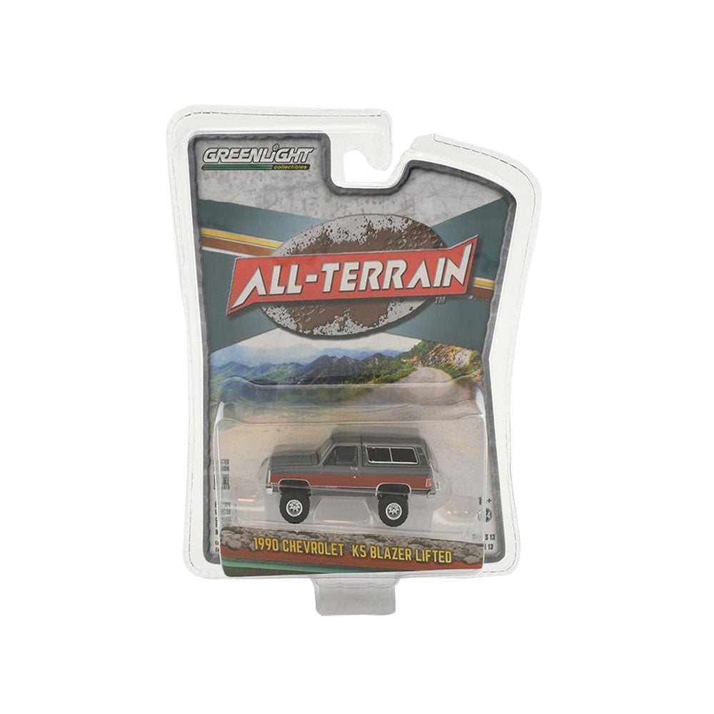 Greenlight Licensed 1:64 Scale Chevrolet K5 Blazer Lifted 1990 Diecast Model Car Grey & Red